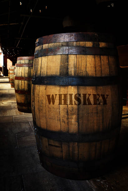 istock Whiskey aging in old wooden barrels 1042539650