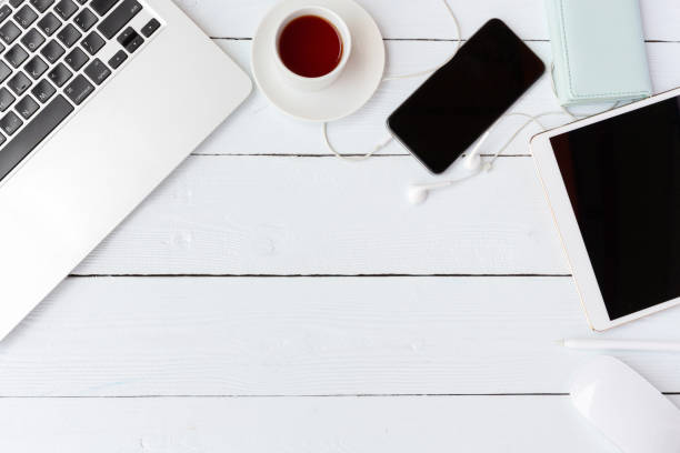 istock Vintage white Gadget mockup flat lay on old table top wood background texture space concept workspace office blank note, plan on workplace, business blogger idea empty wooden view 1042545240