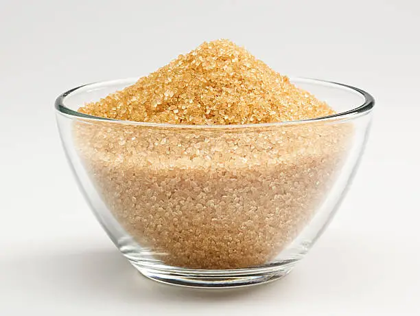 Cane sugar in a glass bowl