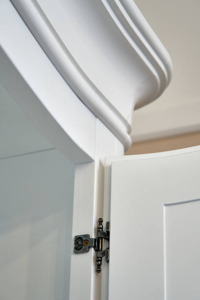 istock Cornice of a classic wardrobe. Close-up 1042548456