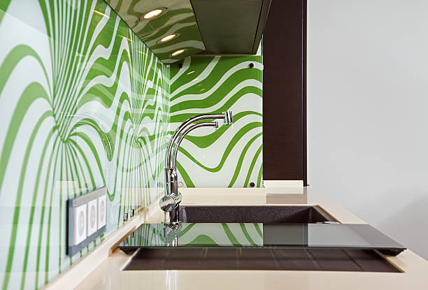 istock Swirling green & white art & modern Kitchen interior w/ sink 104255010