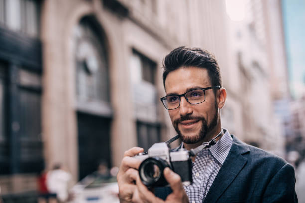 istock Gentleman taking pictures 1042554302