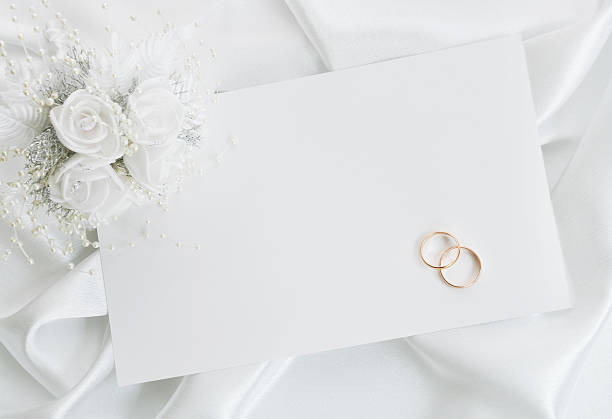 istock Blank white wedding invitation with gold rings and roses 104255816