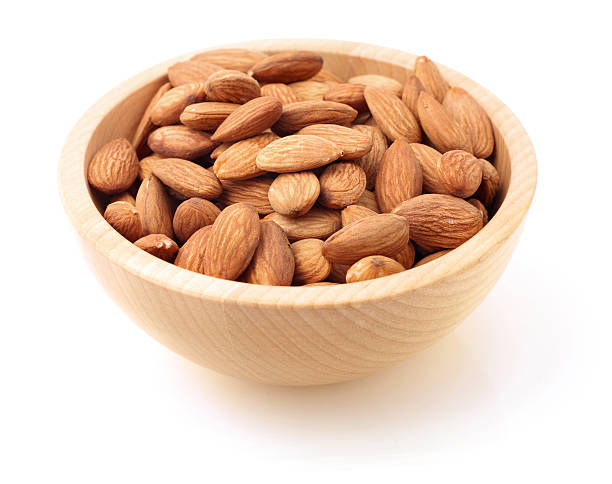 istock Bowl of almonds on white 104256087
