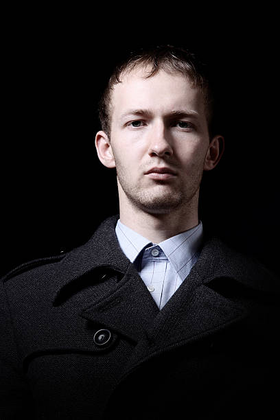 istock Portrait of man on black background 104256088