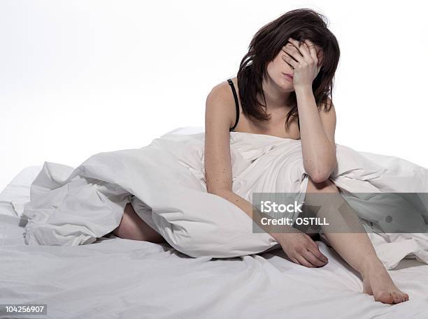 Woman In Bed Rude Awakening Tired Exhausted Stock Photo - Download Image Now - Adult, Adults Only, Bed - Furniture