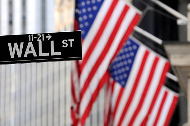 istock U.S. flags on Wall Street 104257362
