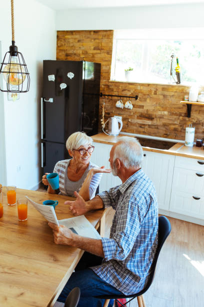 istock Happy senior couple drinking coffee 1042584164