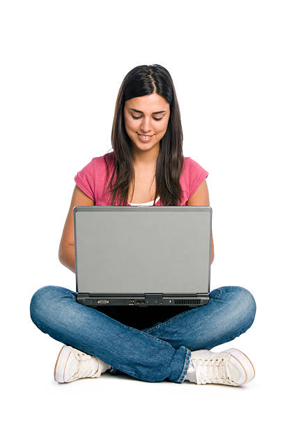 istock Smiling girl working on laptop 104258824