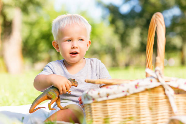 istock Excited small kid playing with a favourite toy 1042589582