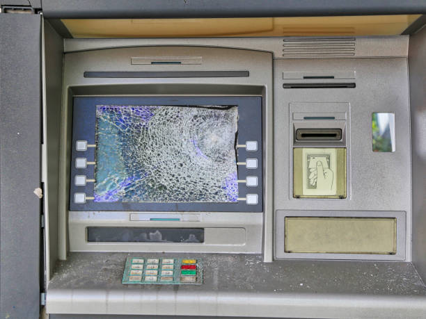 istock Bank robbery and broken ATM concept 1042589840