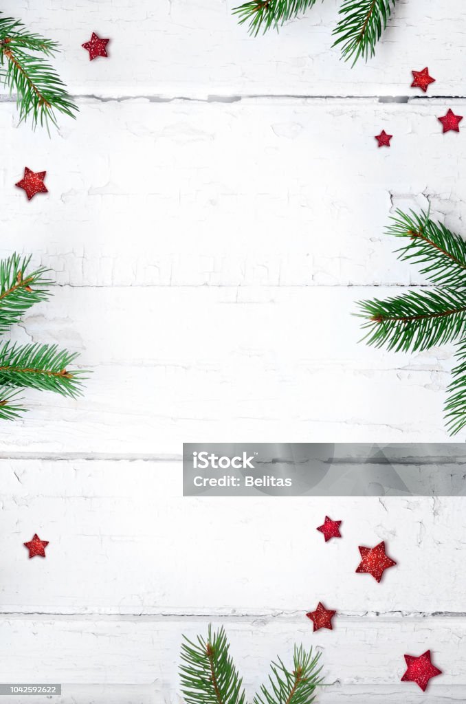 Christmas composition. Christmas gift, candy cane and fir tree branches. Top view, flat lay. Christmas composition. Christmas gift, candy cane and fir tree branches. Top view, flat lay Christmas Stock Photo