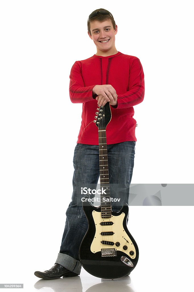 Jeune homme avec une guitare - Photo de Adolescence libre de droits