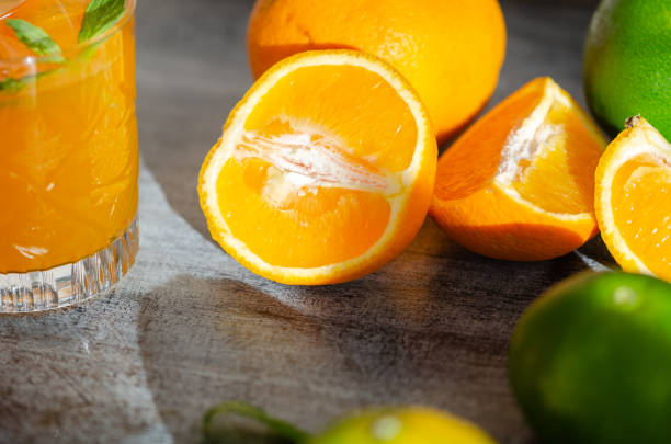 istock Freshly squeezed orange juice and orange 1042598710