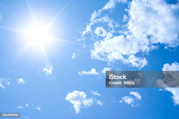 Blue Sky With Clouds And Solar Flare Stock Photo - Download Image Now - Backgrounds, Beauty In Nature, Blue