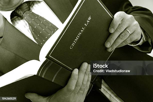 Lawyer Holding Criminal Law Book Stock Photo - Download Image Now - Book, Color Image, Crime