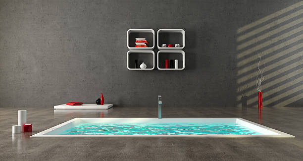 минималистский ванная комната - candlelight concrete bathtub candle стоковые фото и изображения