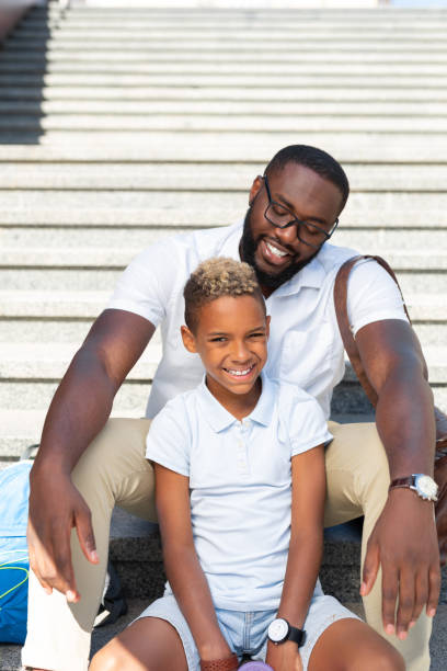 istock Delighted happy boy enjoying time with dad 1042610118