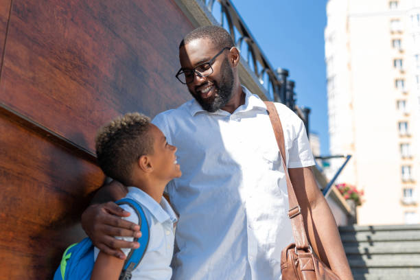 istock Positive nice man being proud of his son 1042610620