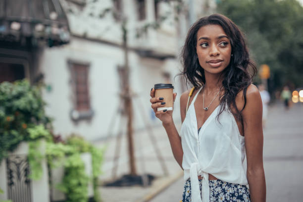 istock Cute black woman on coffee break 1042614206