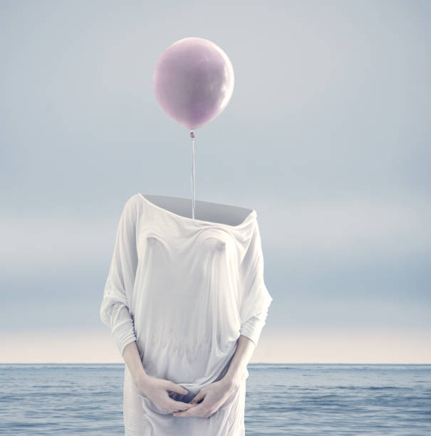 istock nohead women with lilac balloon 1042615260