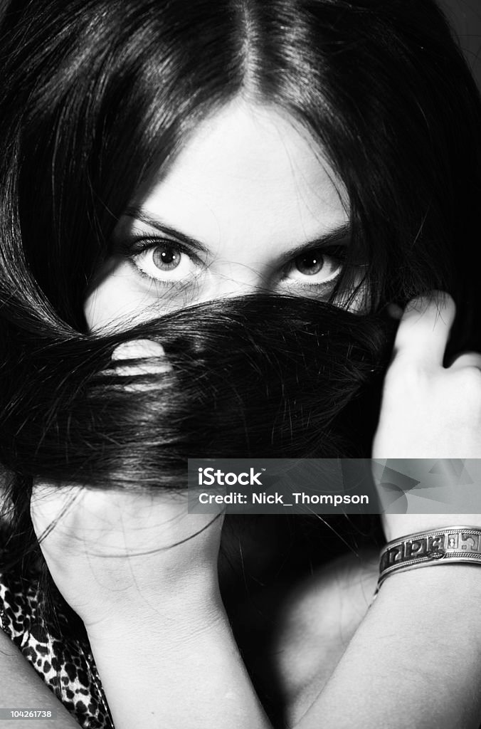 BW portrait of attractive girl wrap hair around your head  Adult Stock Photo