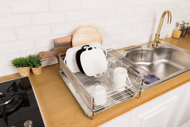 istock Kitchen utensils and dishware on wooden shelf. Kitchen interior background.Text space. 1042617746