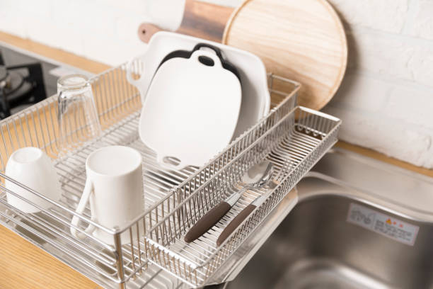 istock Kitchen utensils and dishware on wooden shelf. Kitchen interior background.Text space. 1042617960