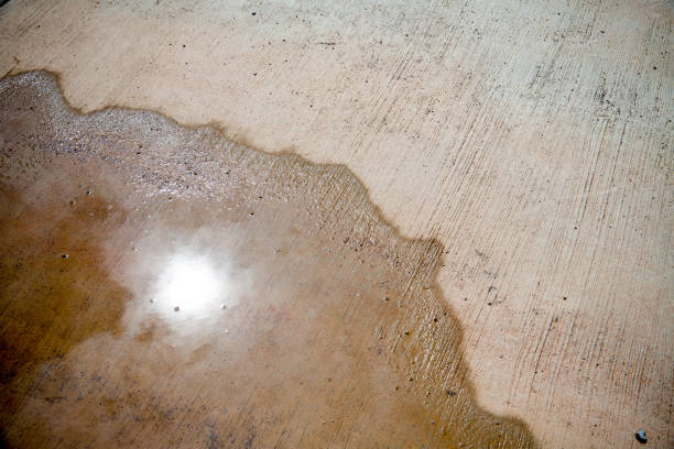 Sun reflected on water on the road.