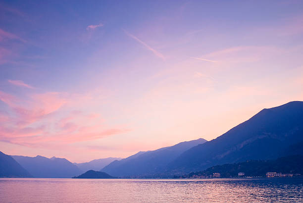 istock Mountains against sea at sunset 104261904