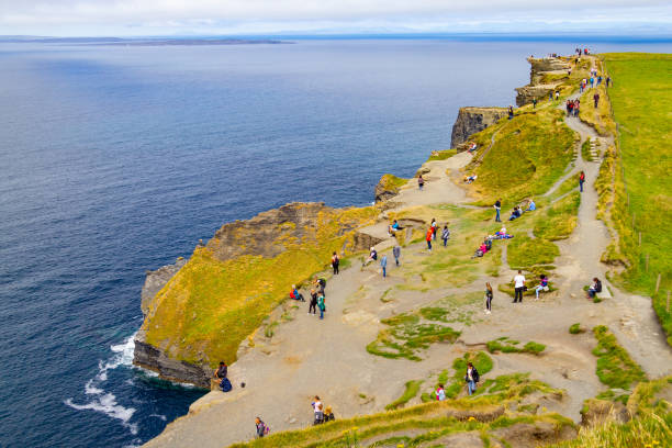 istock People walking over Cliffs of Moher 1042621624
