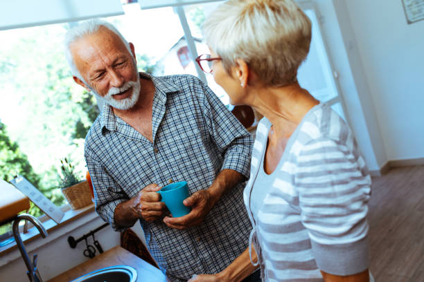 istock Senior couple preparing breakfast 1042622176