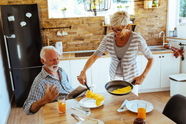 istock Senior couple having breakfast 1042622720