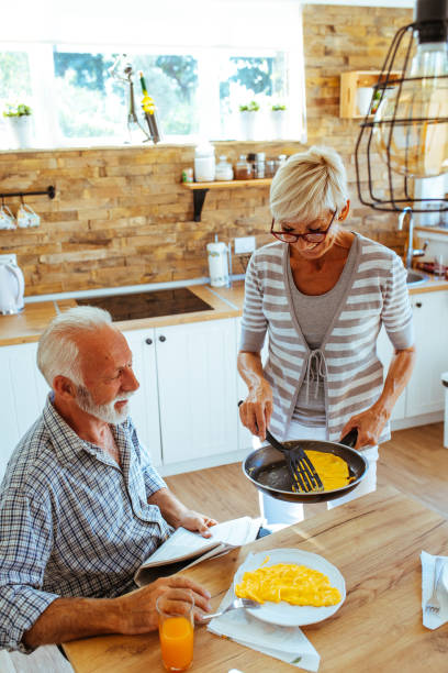 istock Senior couple having breakfast 1042622912