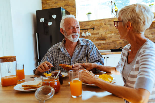 istock Senior couple having breakfast 1042624936