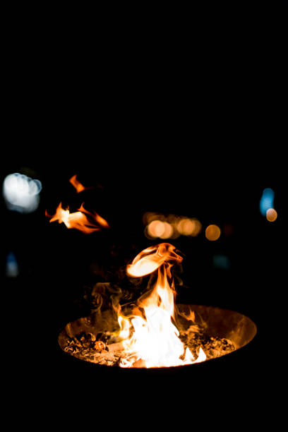 istock Burning flame isolated on a black background 1042625984