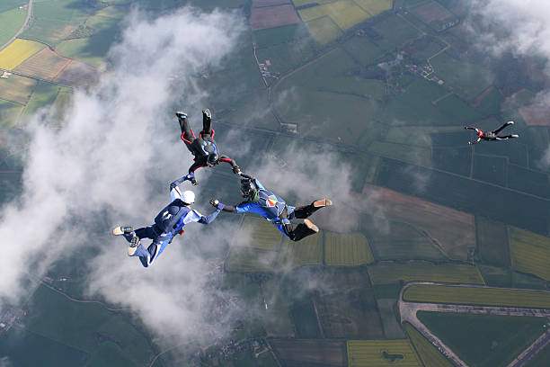 Skydivers 220+ Skydivers Holding Hands Stock Photos, Pictures & Royalty-Free ...