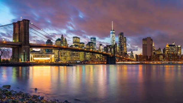 istock Brooklyn bridge and Manhattan at dusk 1042636116
