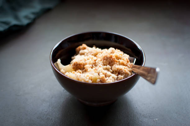 Pear crumble in a bowl stock photo