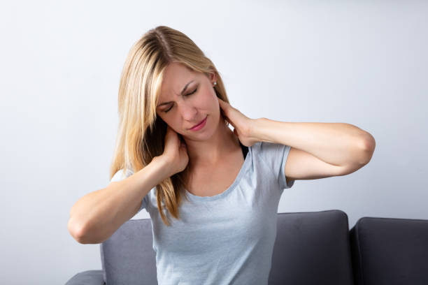 istock Woman Suffering From Neck Pain 1042650974