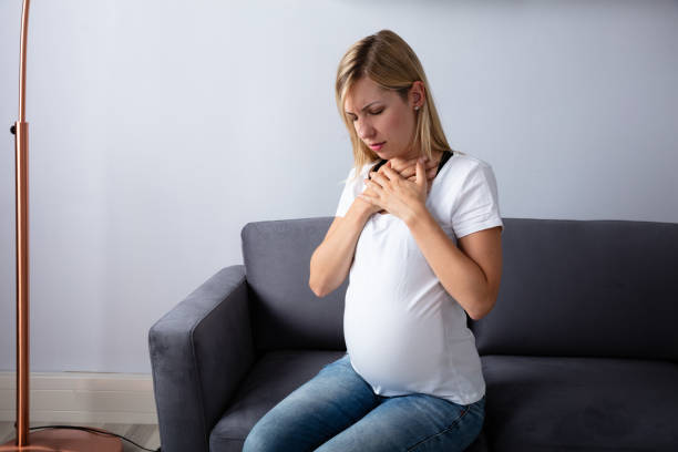 istock Pregnant Woman Suffering From Nausea 1042651036