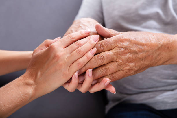 istock Daughter Holding Her Father's Hand 1042652208