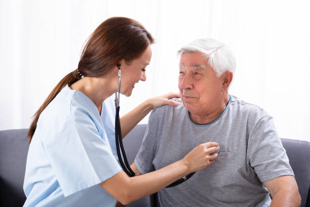 istock Nurse Examining Senior Man With Stethoscope 1042652376