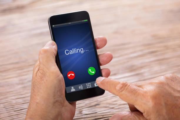istock Man Holding Smartphone With Incoming Call 1042652452