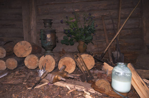 istock Firewood in the barn. A wooden shed. 1042660512