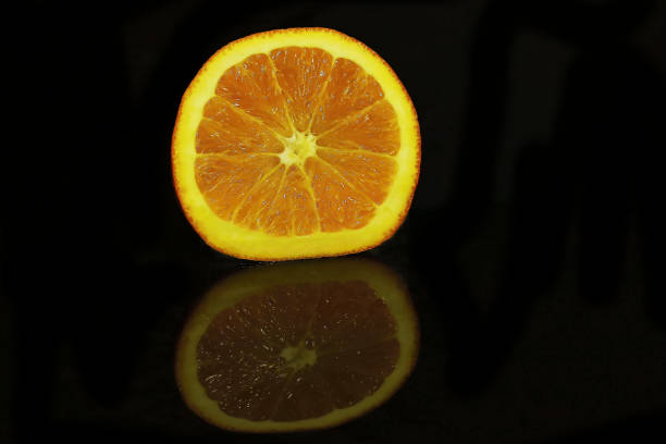 Orange fruit with black background