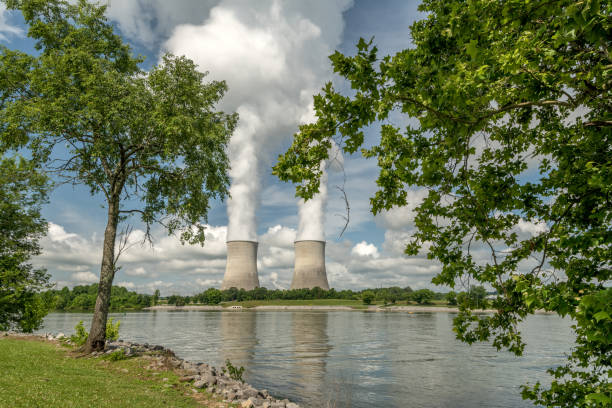 istock Recreation area park with nuclear cooling towers with reflection in lake 1042673582