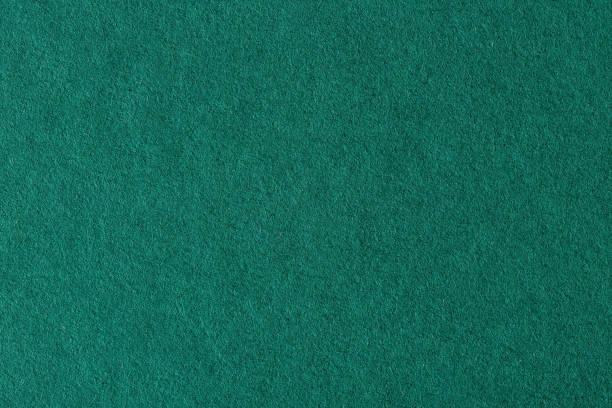 istock Art green paper textured background. High resolution photo. 1042674344