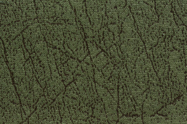 istock Saturated elegant green textile background on macro. 1042674950