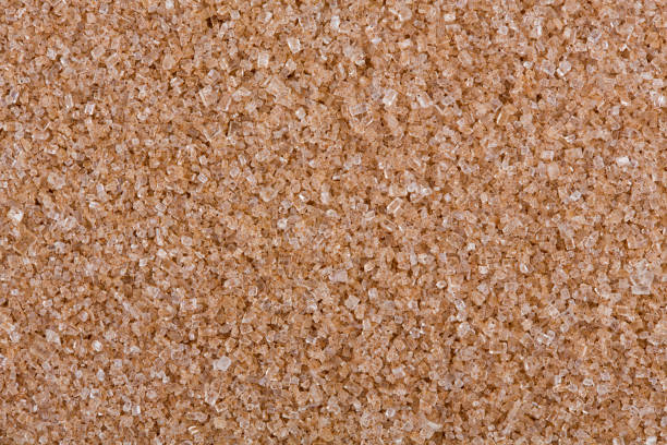istock Brown cane sugar for background. High resolution photo. 1042677540